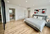 Erstbezug: Familienwohnung mit Fernblick über Wien, inkl. Freifläche, zwei Stellplätze und Outdoor-Pool