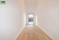 3.Zimmer-Erstbezug in Hofruhelage mit einer atemberaubenden Raumhöhe und Garten - sofort beziehbar in Nähe der U1 (Nettopreis)! - JETZT ZUSCHLAGEN