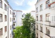 MITTEN IM SIEBTEN | Südseitige Stil-Altbauwohnung mit Grünblick | Hofruhelage | Prachtvolles Jahrhundertwende-Haus