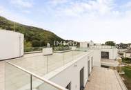 Meisterstück moderner Architektur: Penthouse mit 230m2 Terrasse & Wasserblick