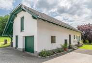 Zweifamilienhaus mit vielseitigem Gewerbebereich & exklusivem Wellnesshaus