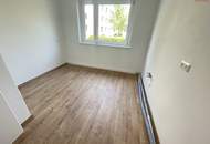 Erdgeschoss- 3 Zimmerwohnung mit Balkon!