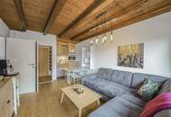 Dachgeschosswohnung an der Skipiste mit Kaiserblick