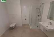 Gartenwohnung mitten in der Stadt! Karmeliterhof - Neubauwohntraum beim Rathausplatz