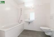Exklusive Erstbezugs-Wohnung mit 55 m² Wohnküche und großer Hof-Terrasse! Küche und Top Ausstattung inkludiert!