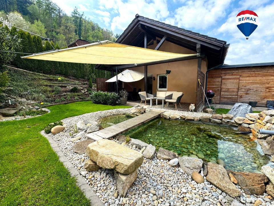 Ihr kleines Wohnparadies: Neuwertiger Bungalow mit Garten und Carport
