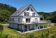 Moderne, Erstbezug-Gartenwohnung mit Traumblick auf den Wörthersee! Touristische Nutzung möglich!