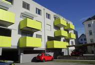 Neubauwohnung in Zentrumslage mit großer Balkon-Loggia und Carport