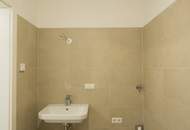 MODERNE 2-ZIMMER BALKONWOHNUNG - ERSTBEZUG UND TIEFGARAGENPLATZ