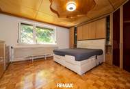 Gepflegtes Einfamilienhaus mit 2 Wohneinheiten, Garten/Terrasse &amp; 3 Garagen in sonnige Ruhelage!