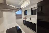 Sehr gepflegte Erdgeschoss- Wohnung mit Eigengarten und Carport