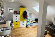 Mauer "Licht. Ruhe. Effizienz. Stilvolle Maisonette mit Südterrasse" | ZELLMANN IMMOBILIEN