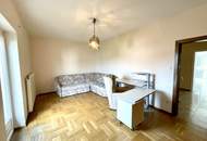 Zentral gelegenes Ein- bis Zweifamilienhaus mit großem Garten und Doppelgarage!