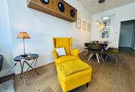 Hugerburg: Loftartige Designerwohnung mit Terrasse und Tiefgaragenstellplatz