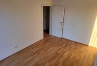 Exklusiver Neubau im 10. Stock mit Seeblick, Kochinsel & großzügigem Balkon – moderne 3-Zimmer-Wohnung