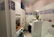 Gemütliche Wohnung im Zentrum mit Balkon und Tiefgaragenstellplatz!