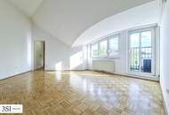 Lichtdurchflutete Dachwohnung mit weitläufigem Grünblick!