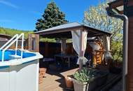 GANZJÄHRIG BEWOHNBAR!!!Pflegeleichter Garten mit Pool, Vollholzhaus Lärche wird verkauft!