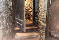 Baugrundstück mit sanierungsbedürftigem Bauernhof in schönster Lage