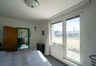 Dachgeschoßwohnung mit 22 m² Südterrasse &amp; Fernblick | Nähe Reumannplatz | Ruhelage