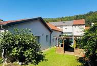 Einfamilienhaus mit Garage & Wintergarten in Ortsrandlage