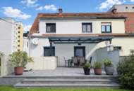 Stilvolle Doppelhaushälfte mit Garten, Designküche und überdachter Terrasse