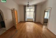 BEI DER ECKE NEUBAUGASSE! LEISTBARE GEBRAUCHTE WOHNUNG IN HOFRUHELAGE! SCHÖNES ALTBAUHAUS! SEHR ZENTRAL! Für Eigennutzer aber auch Anleger.