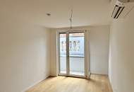 Eleganz trifft Lage – Neubau-Dachgeschosswohnung in Toplage