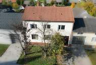Einfamilienhaus mit großem Grundstück und Nebengebäuden