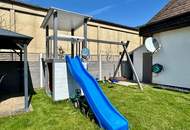 Charmante Dachgeschosswohnung mit Eigengarten & Doppelcarport