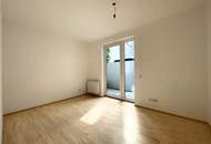 Erdgeschoß, barrierefrei, Innenhof! Ruhige, loft-artige Neubauwohnung mit 2 kl. Terrassen