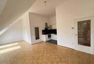 Klimatisierte, großzügige 2-Zimmer-Dachgeschosswohnung mit herrlichem Blick ins Grüne!
