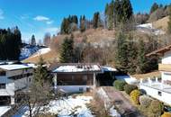 Altbestand auf großem Grundstück in Hanglage