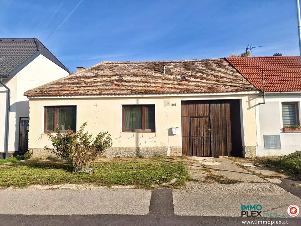 Einfamilienhaus in Ruhelage mit Schuppen und 4 Zimmer auf großem Grundstück, sanierungsbedürftig, zu kaufen!