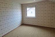 Mehrfamilienhaus mit Geschäftslokal