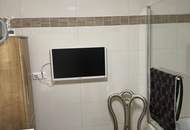 Top ausgestattetes GARTENAPARTMENT mit einer EXTRA TERRASSE und einem TIEFGARAGENPLATZ