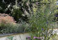 Wohnen am grünen Stadtrand - 160 m² Gartenwohnung in absoluter Ruhelage