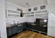 Exquisite Dachgeschosswohnung mit beeindruckender Dachterrasse!