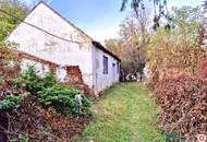 Einfamilienhaus in Ruhelage mit Schuppen und 4 Zimmer auf großem Grundstück, sanierungsbedürftig, zu kaufen!