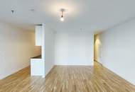 Sonnwendviertel: 1-Zimmer-Wohnung mit Balkon im 18. OG – Fitnessraum, Co-Working & Rooftop-Terrasse inklusive!