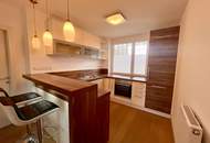 Gepflegte 2-Zimmer-Wohnung mit Balkon und Tiefgaragenstellplatz - WG geeignet!