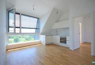 Exklusive 2‑Zimmer‑DG‑Wohnung mit sonniger Hofterrasse und Weitblick über Wien