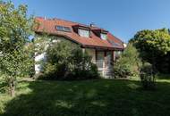 "Familienfreundliches Einfamilienhaus mit Wellnessbad, Sauna, Kachelofen, Fußbodenheizung, großem Garten und Doppelgarage in Tulln"