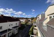 Ruhige 2-Zimmer Wohnung mit Grünblick, Terrasse und 2 Garagenplätzen