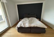 Neuwertige 2-Zimmer-Eigentumswohnung mit Kamin, Loggia und Garage