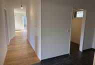 Moderne Gartenwohnung mit Charme und Bergblick