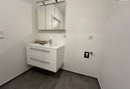 WUNDERVOLL! Lassen Sie sich begeistern! Helle 2-Zimmer-Neubauwohnung mit großzügigem Balkon, exklusiver Tischlerküche und Tiefgaragenplatz!