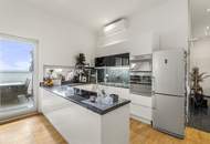 Wohnen über den Dächern von Graz mit Blick auf den Schlossberg: Exklusive Stadtwohnung mit Terrasse