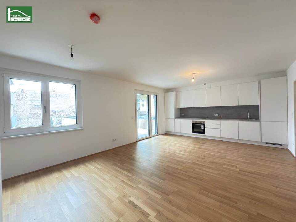 Hochwertige Erstbezugs-Anlegerwohnung mit großem Hof-Balkon und Küche nahe Schönbrunn!