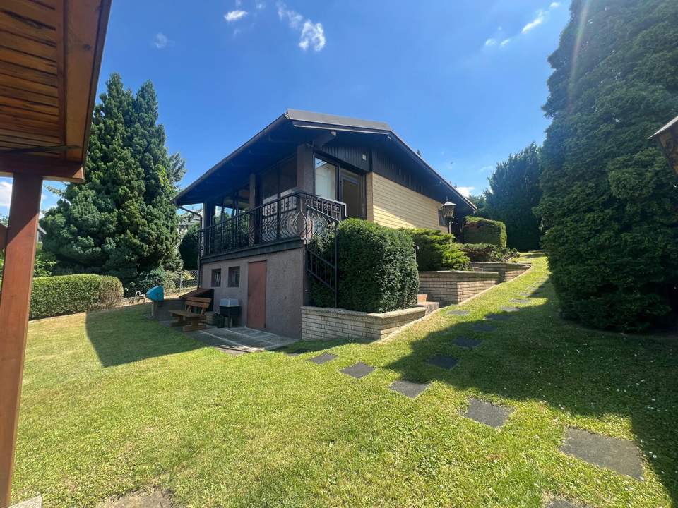 Traumhaftes Einfamilienhaus mit Garten und Sauna mit Seeblick auf Pachtgrund – Ihr neues Zuhause!